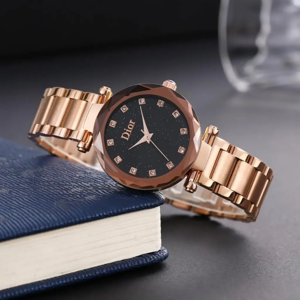 Elegant Rose Gold-Tone Fashion Watch with Faceted Bezel and Black Crystal Dial